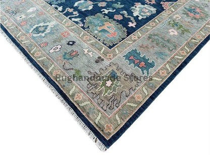 Handmade Oushak wool rug in blue and gray with intricate floral Turkish knot design for living room decor