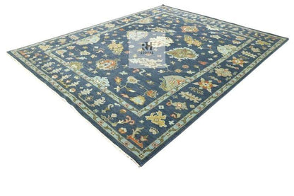 Handmade Oushak wool rug in olive green, beige, and gray with floral Turkish knot design for living room decor