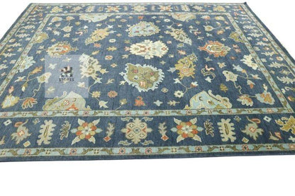 Handmade Oushak wool rug in olive green, beige, and gray with traditional Turkish knot design for living room decor