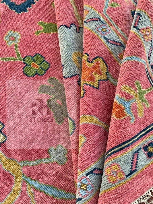 Handmade Oushak wool rug with pink and sky blue floral design, rectangular 8x10 area rug, Turkish knot craftsmanship