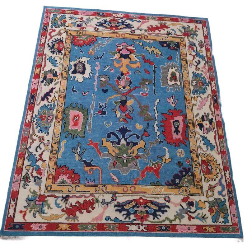 Handmade Oushak wool rug with dark blue Turkish knot floral design, 8x10 area rug for living room and home decor