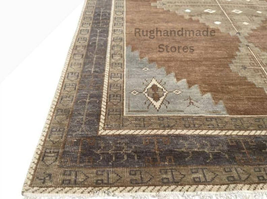 Handmade Oushak wool rug in vintage brown and beige with floral Turkish knot design, 8x10 feet