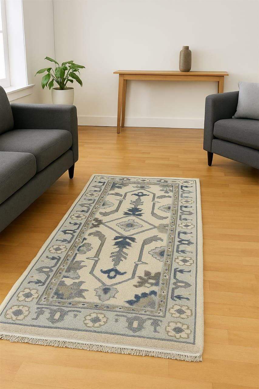 Handmade Oushak wool runner rug in ocean blue, green, and ivory floral design, 2.6x7 ft, rectangular shape.