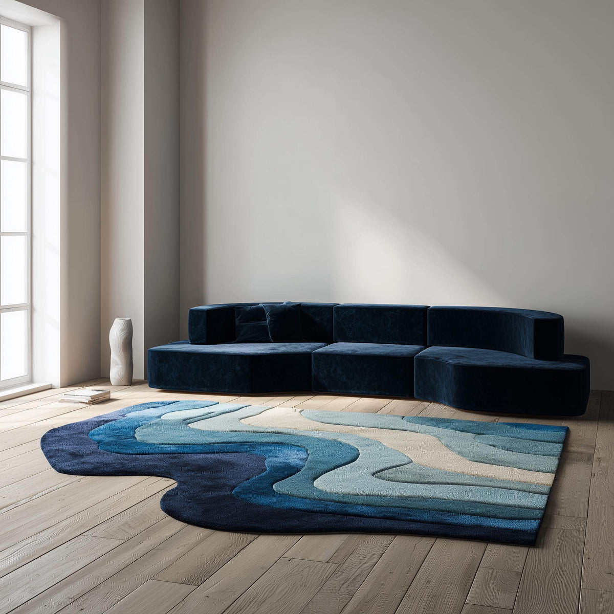 Handmade tufted wool rug with abstract blue and cream wave design, 5x8 ft area carpet