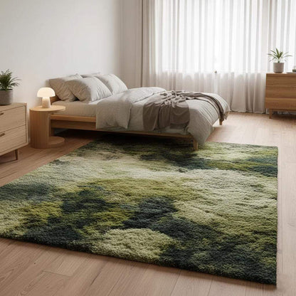 Plush high-pile rug in layered green shades resembling natural moss.