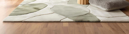 Handmade wool tufted rug with abstract sage green and beige patterns in 8x10 size