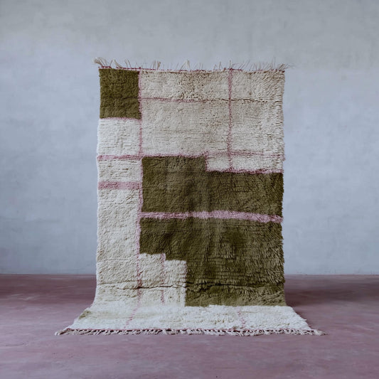 Handwoven Moroccan Beni Ourain rug with cream, olive geometric blocks, and dusty-pink grid lines on wool shag pile