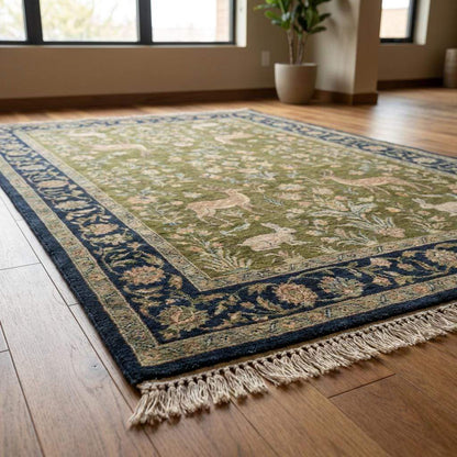 Indo-Persian hand-knotted wool area rug with animal floral pattern in living room setting