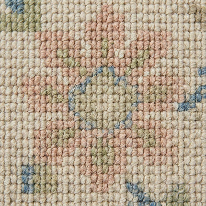Ivory floral wool rug with pastel flowers and low-profile pile for living room decor