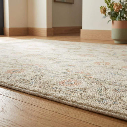 Ivory floral wool rug with delicate pastel flowers and soft low-profile pile for living room decor
