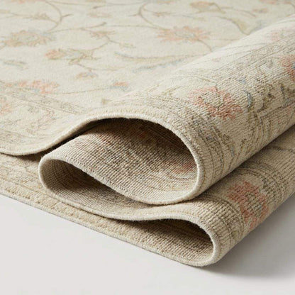 Ivory floral wool hand knotted rug with pastel vine pattern for living room decor