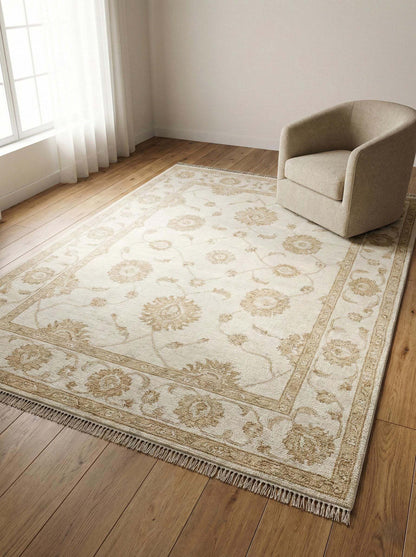 Ivory Oushak area rug with hand-knotted wool and soft floral design for elegant living rooms