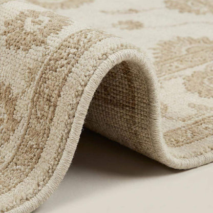 Close up of hand knotted wool pile showing individual knots and natural fiber texture