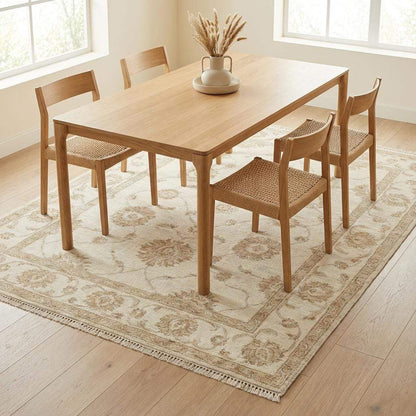 Elegant ivory wool hand knotted area rug with subtle floral detailing