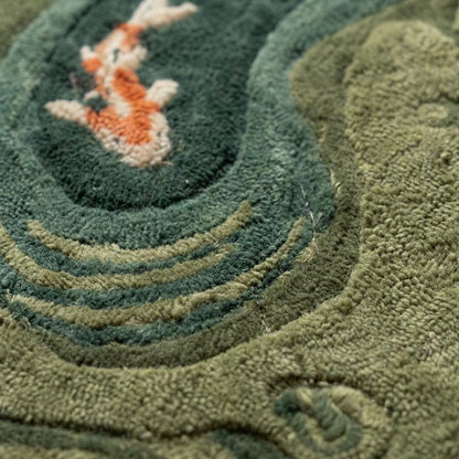Irregular organic shaped wool rug designed as calming koi pond statement décor piece.