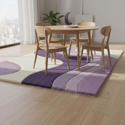 Lavender area rug with modern retro curvy stripe pattern and plush tufted surface