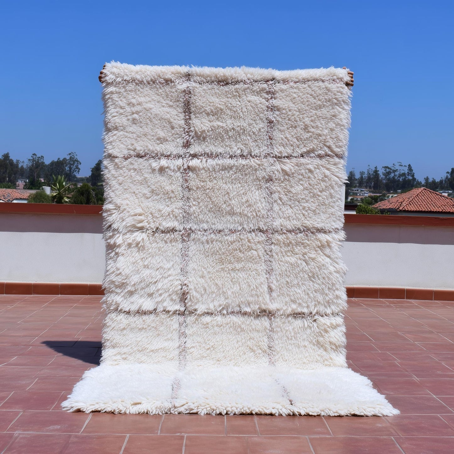 Luxury cream Moroccan shag rug with plush high-pile wool and handwoven Berber grid pattern for cozy boho living room decor