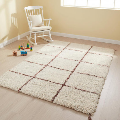 Neutral high-pile shag rug with textured fibers, ideal for modern, minimalist, or boho-style interior design.