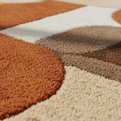 Mid century area rug with plush thick pile and geometric retro pattern in burnt orange, mustard yellow, and cream tones.