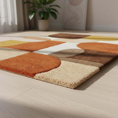 Mid century area rug with plush thick pile, geometric retro pattern in burnt orange, mustard yellow, and cream tones