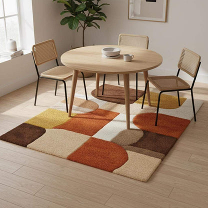 Mid century area rug with plush thick pile and geometric retro pattern in warm burnt orange, mustard yellow, and cream tones.