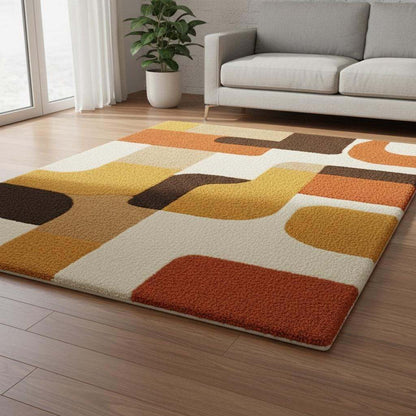 Mid century modern rug with retro geometric design in orange, yellow, brown, and cream tones, soft tufted texture, and durable construction.
