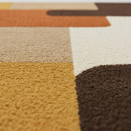 Mid century modern rug with retro geometric design in warm orange, yellow, and brown tones, soft tufted texture, and durable handmade construction.
