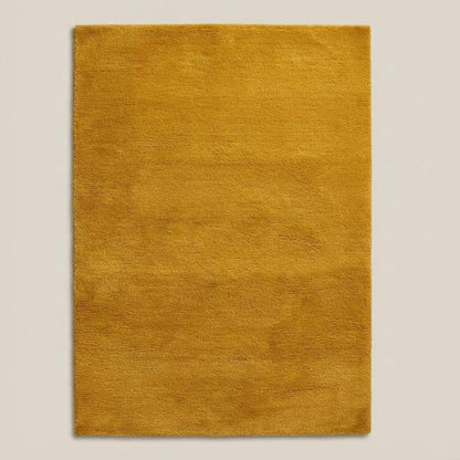 Mustard yellow area rug with retro mid century design and soft low pile texture for modern living room decor