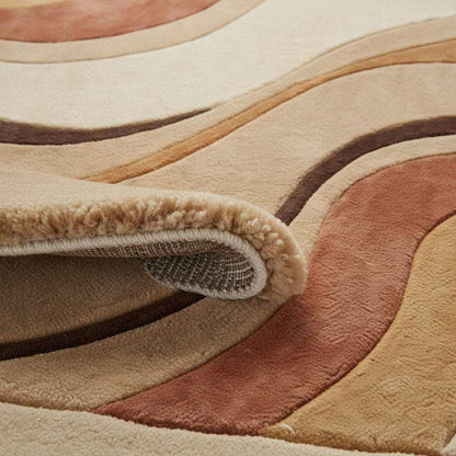 Abstract curved pattern rug with flowing lines and sculpted shapes, inspired by mid century modern design and retro interior styling.