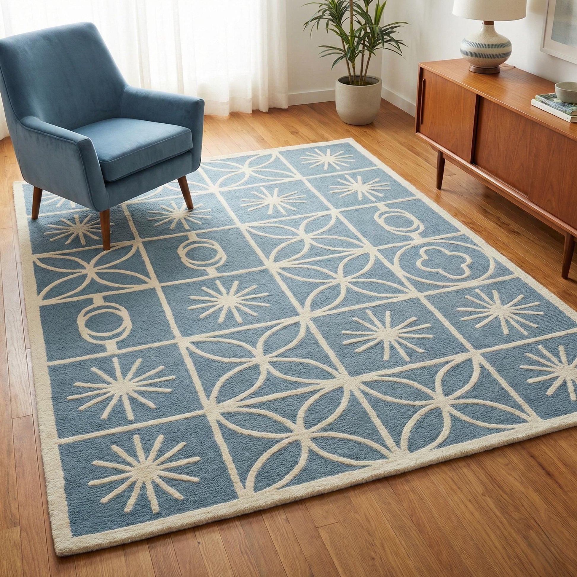 Mid Century Modern blue area rug with Scandinavian cream geometric starburst pattern and soft plush pile