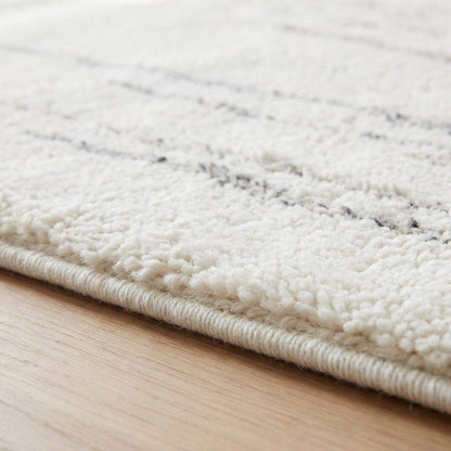 Minimalist cream runner rug with gray accents, hand-tufted wool, modern neutral design for kitchen and hallway decor