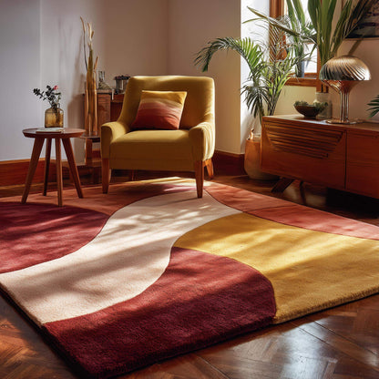 Modern abstract rug with red, yellow, and cream curved design in living room.