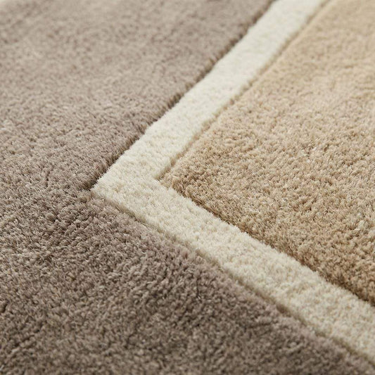 Modern beige geometric border hand-tufted area rug with soft wool pile and minimalist design