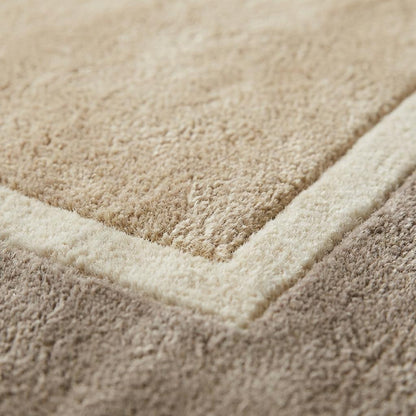 Modern beige geometric border hand-tufted area rug with soft wool pile and minimalist design