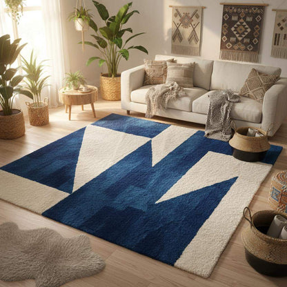 High-pile tufted wool rug in cobalt blue and ivory with modern abstract design for stylish living room decoration.