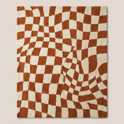 Modern checkerboard wavy tufted rug with retro geometric pattern in warm earthy tones