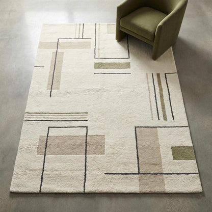 Modern geometric area rug with minimalist line pattern in cream, sage green, and neutral tones for contemporary decor