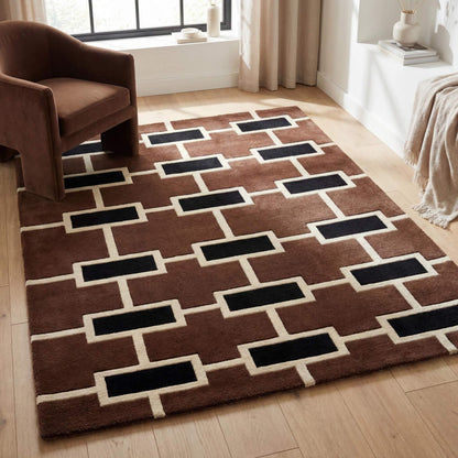 Modern geometric hand tufted rug with brown background and black brick pattern in contemporary living room setting __etsy:7837843191