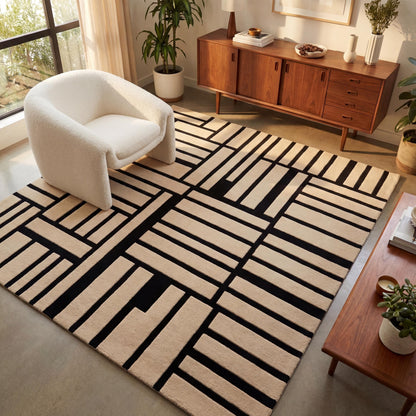 Modern geometric hand tufted wool area rug with black and cream abstract grid pattern for contemporary living rooms