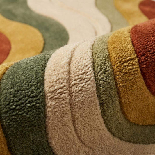Close-up of hand tufted wool rug showing dense soft pile with carved wave texture pattern __etsy:7896500598