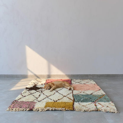 Modern Moroccan rug with colorful geometric and Berber diamond patterns in a soft shag texture