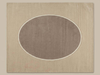 Modern neutral oval hand-tufted wool rug in beige and taupe for living room decor
