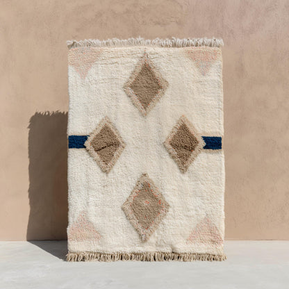 Moroccan Diamond Wool Rug in cream, taupe, and navy with plush texture and geometric boho design