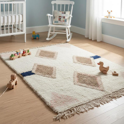 Neutral accent rug with global design – wool Moroccan style diamond pattern in cream and taupe with navy highlight.