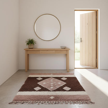 Handmade-style wool area rug in modern Moroccan design, ivory base, beige and brown highlights, soft blush undertones, high-pile texture.