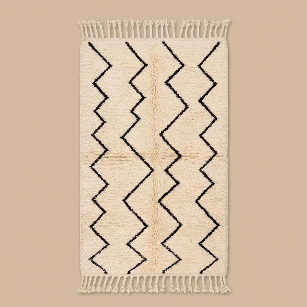 Neutral geometric Berber style rug with fringe tassels
