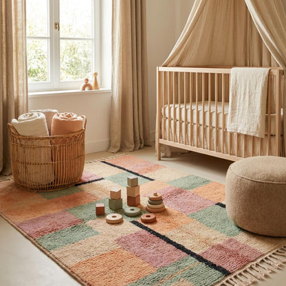 Desert styled scene featuring geometric Moroccan style rug with earthy tones