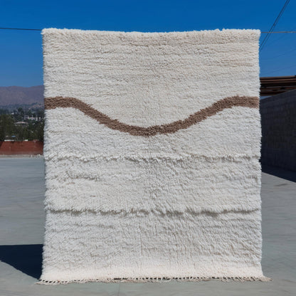 Cream Moroccan shag rug with high pile and wavy taupe Berber design
