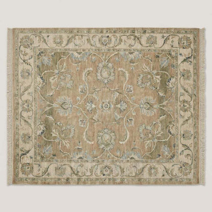 Hand-knotted Oushak floral wool area rug with beige and sage-blue tones, crafted from durable soft wool for vintage-inspired warmth and elegance