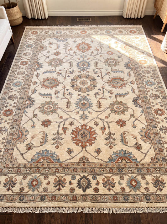 Hand knotted Oushak rug featuring floral medallion motifs, ivory field, decorative border, and traditional Turkish inspired design. __etsy:8074602724